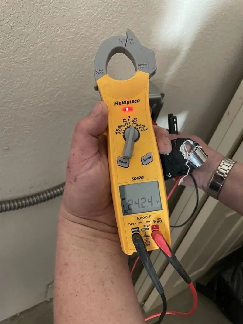 Voltage testing with clamp meter during Aluminum Wiring Replacement in Erie